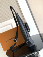 Louis Vuitton monogram crossbody bag side view with zipper pull and shoulder strap