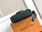 Louis Vuitton textured leather crossbody bag end with metal zipper pull