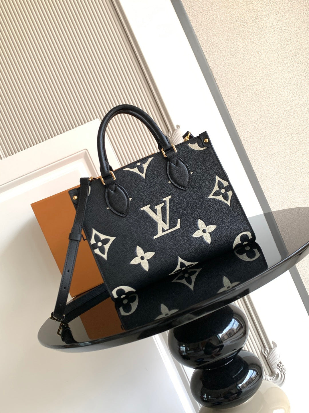 Louis Vuitton tote bag in dark navy with monogram print, dual handles and shoulder strap