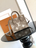 Louis Vuitton monogram handbag in taupe with leather handles and top zip closure