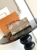 Louis Vuitton monogram small handbag in taupe with front flap and strap