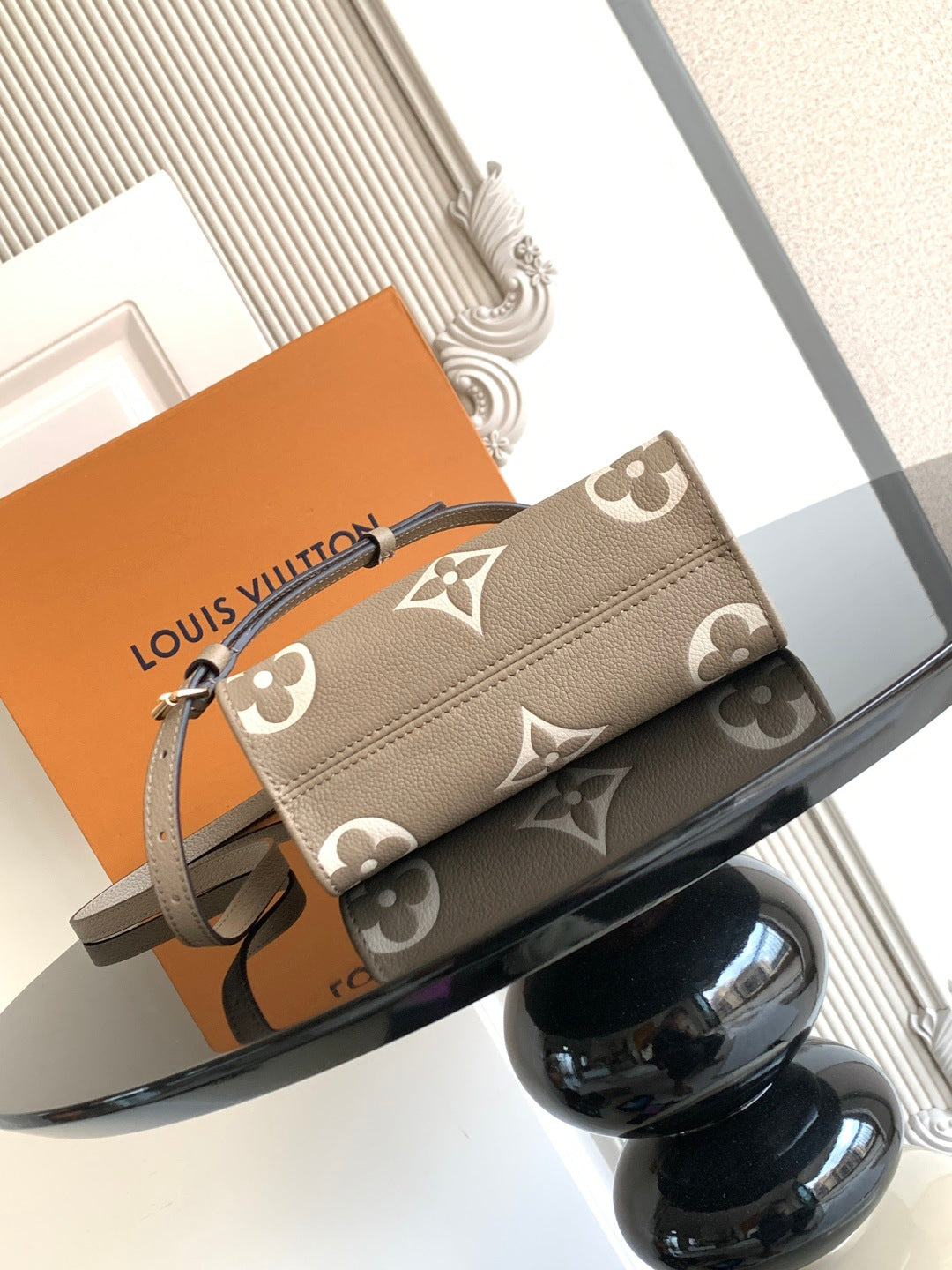 Louis Vuitton monogram small handbag in taupe with front flap and strap