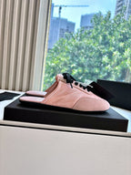 Prada lace-up sneakers for women, pink suede low-top sneaker on display box