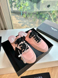 Prada lace-up sneakers for women, pink suede with black laces, in open gift box