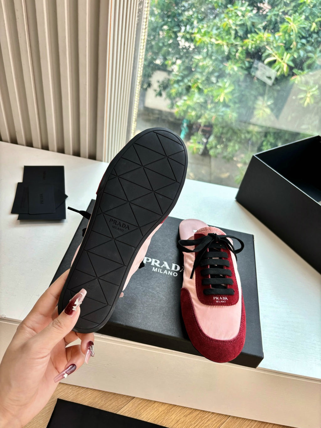 Prada women's sneakers outsole, black tread with geometric pattern