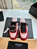 Prada women's sneakers pair, blush pink uppers with burgundy suede and black laces