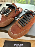 Prada low-top sneakers, tan and brown suede with black laces and round toe