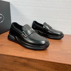 Prada unisex black leather loafers with strap detail and chunky rubber sole