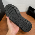 Prada unisex black loafer outsole with textured tread pattern