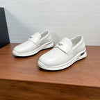 White Prada unisex slip-on sneakers with logo strap and chunky sole