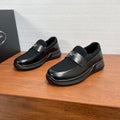 Prada unisex loafers, black leather with ribbed elastic sides and chunky rubber sole