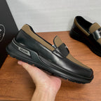 Prada unisex loafers with strap detail, black leather and tan knit trim