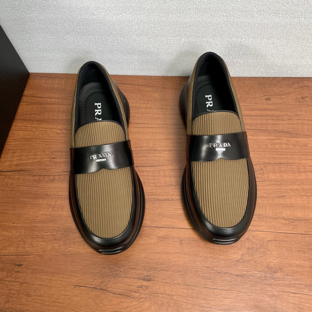 Prada unisex slip-on loafers, black leather with tan knit panels and Prada logo
