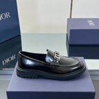 Black leather unisex loafer with Dior buckle strap and thick platform sole
