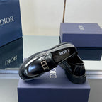 Black leather unisex loafer with Dior buckle strap and stitched apron