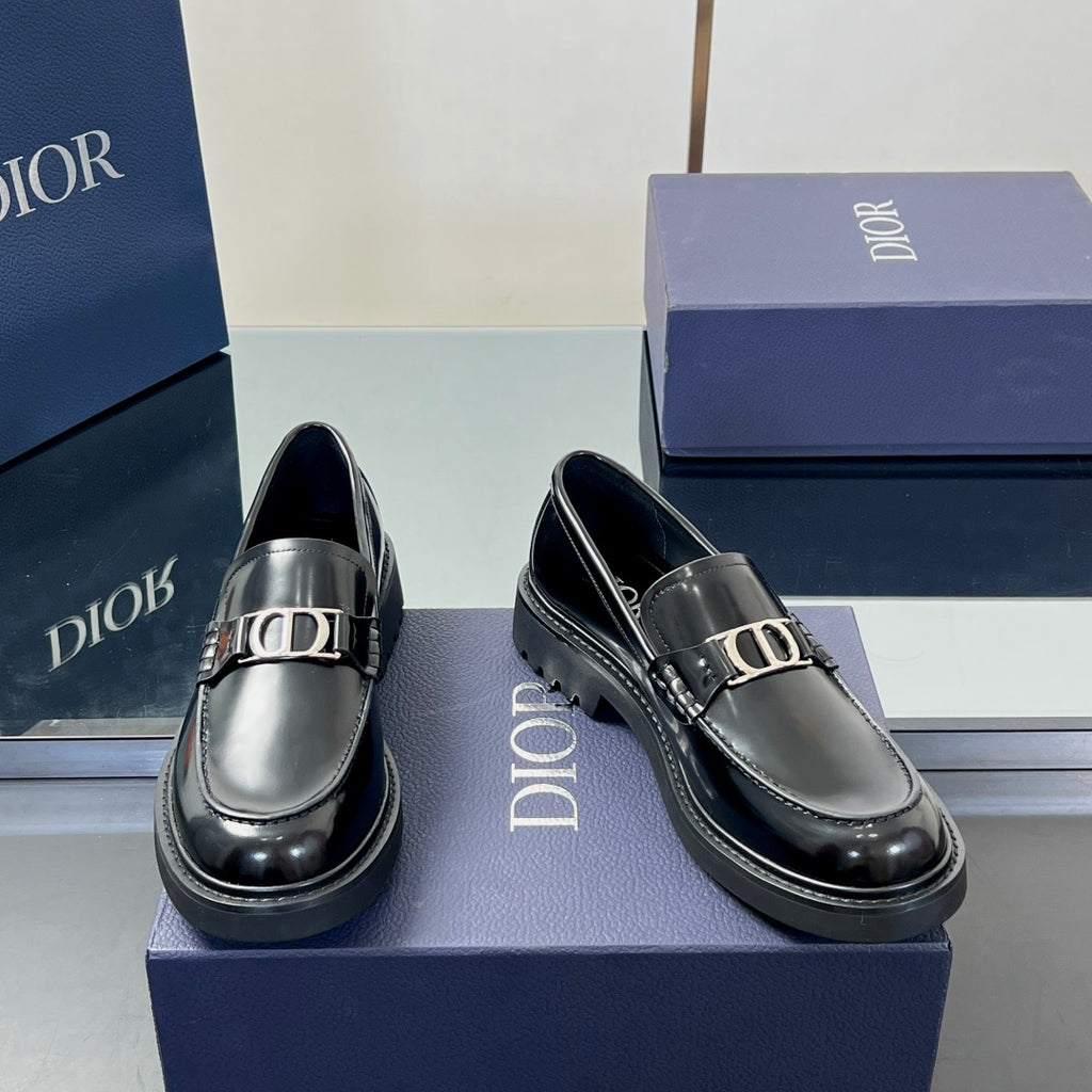 Black leather unisex loafer with metal Dior buckle detail, side view