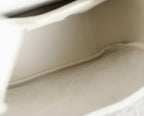 YSL bag white leather interior seam and reinforced edge close-up.