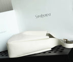YSL bag white leather with smooth base and white strap handle.