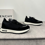 Black Givenchy low-top sneakers with lace-up front and chunky white sole