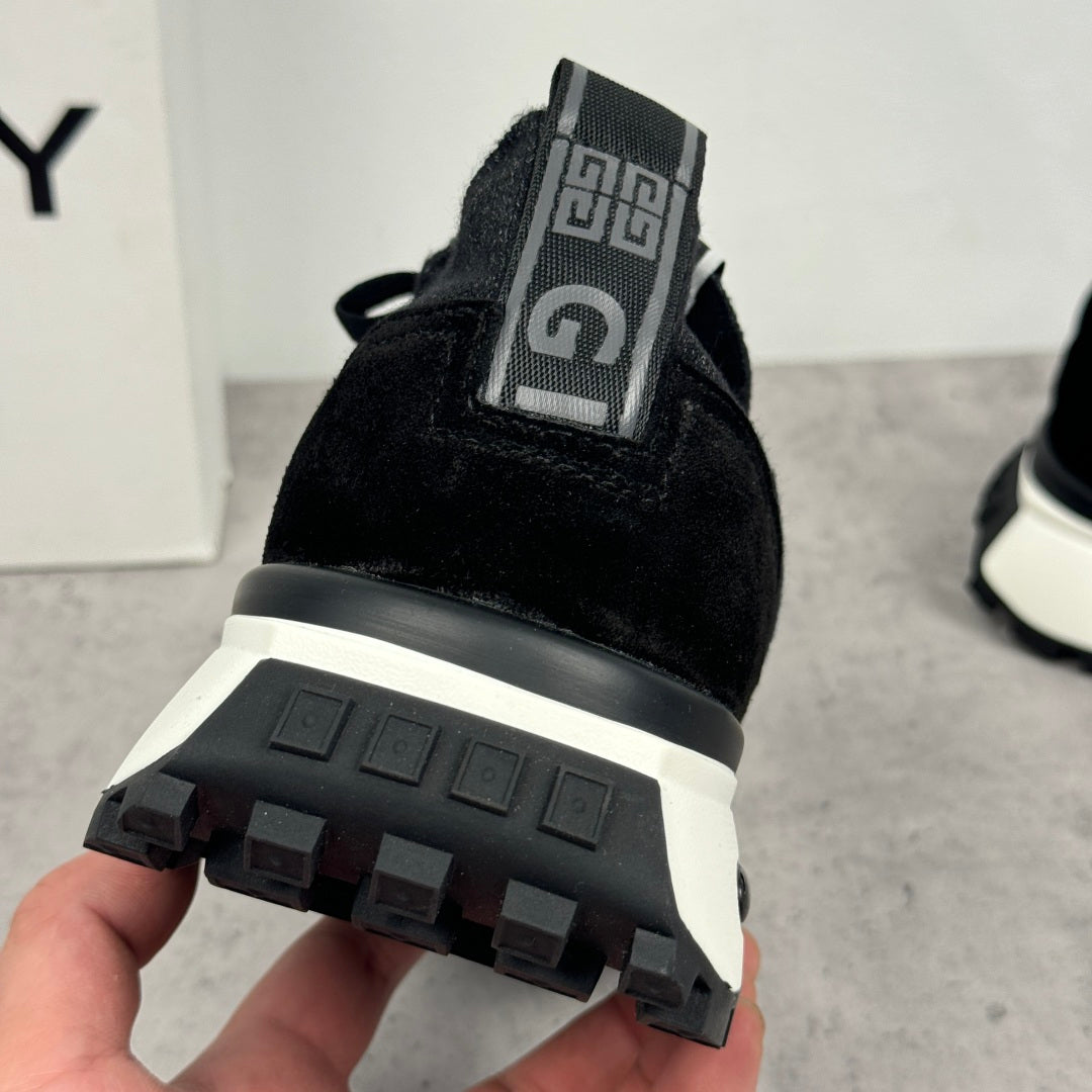 Black Givenchy sneakers heel outsole with grippy tread and white midsole