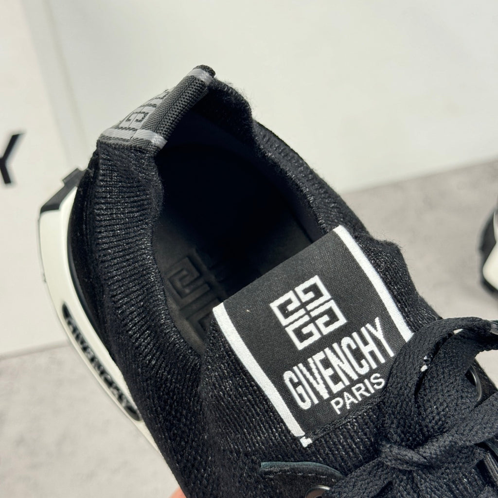 Black Givenchy sneakers with heel logo label and textured collar, white outsole