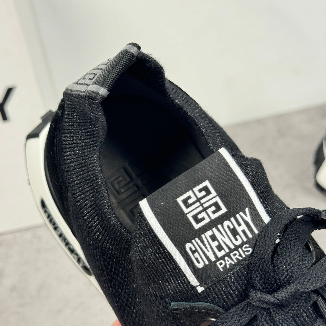 Black Givenchy sneakers with heel logo label and textured collar, white outsole
