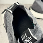 Givenchy sneakers heel and collar view with gray knit lining and white trim
