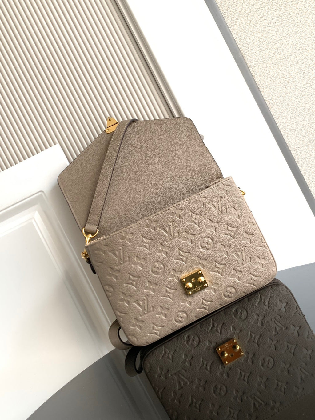 Louis Vuitton monogram crossbody bag in taupe with front flap panel and gold hardware