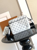 Louis Vuitton crossbody bag with blue monogram pattern, black strap and zipper front