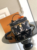 Louis Vuitton crossbody mini bag in black with white monogram and gold chain strap