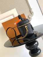 Black Louis Vuitton monogram crossbody bag with front zipper pocket and gold chain strap