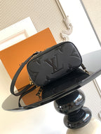 Black Louis Vuitton monogram mini crossbody bag with curved front and chain strap