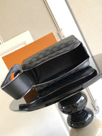 Louis Vuitton crossbody bag with black leather top and dark Damier checkered front