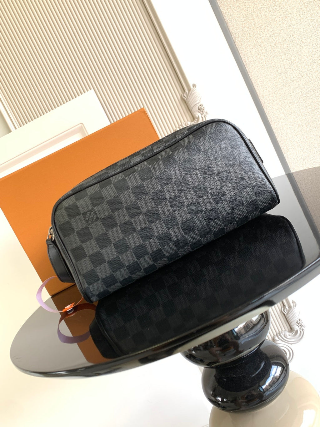 Louis Vuitton crossbody bag with dark Damier checkered canvas and black leather trim