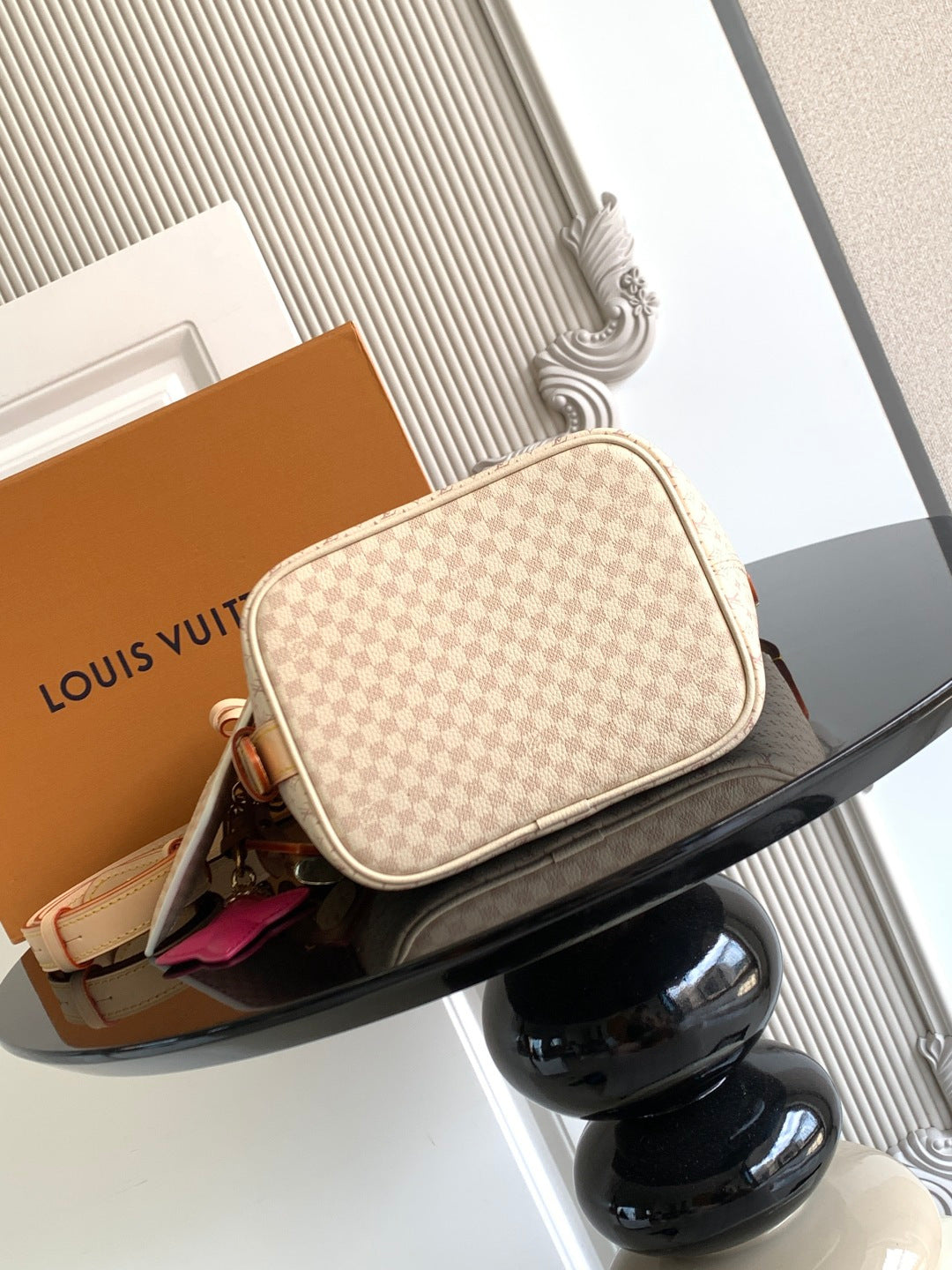 Louis Vuitton crossbody bag with round flap, tan monogram canvas and leather trim