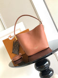 Louis Vuitton leather tote bag in pink with top handle and gold-tone hardware