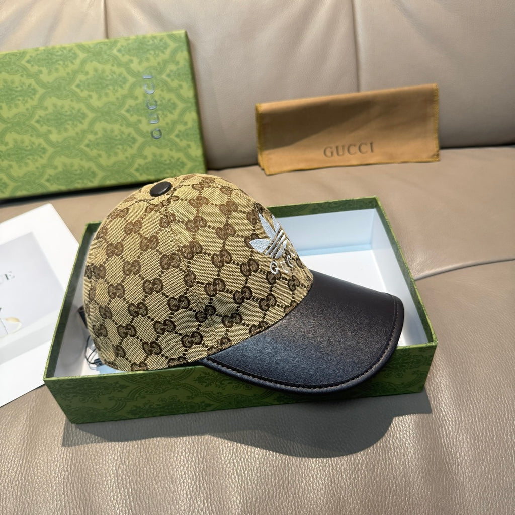 Gucci cap with beige GG canvas front and black curved leather visor