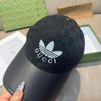 Black Gucci cap with GG monogram crown and white logo, front view
