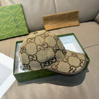 Beige Gucci cap with GG monogram pattern and curved brim, side view