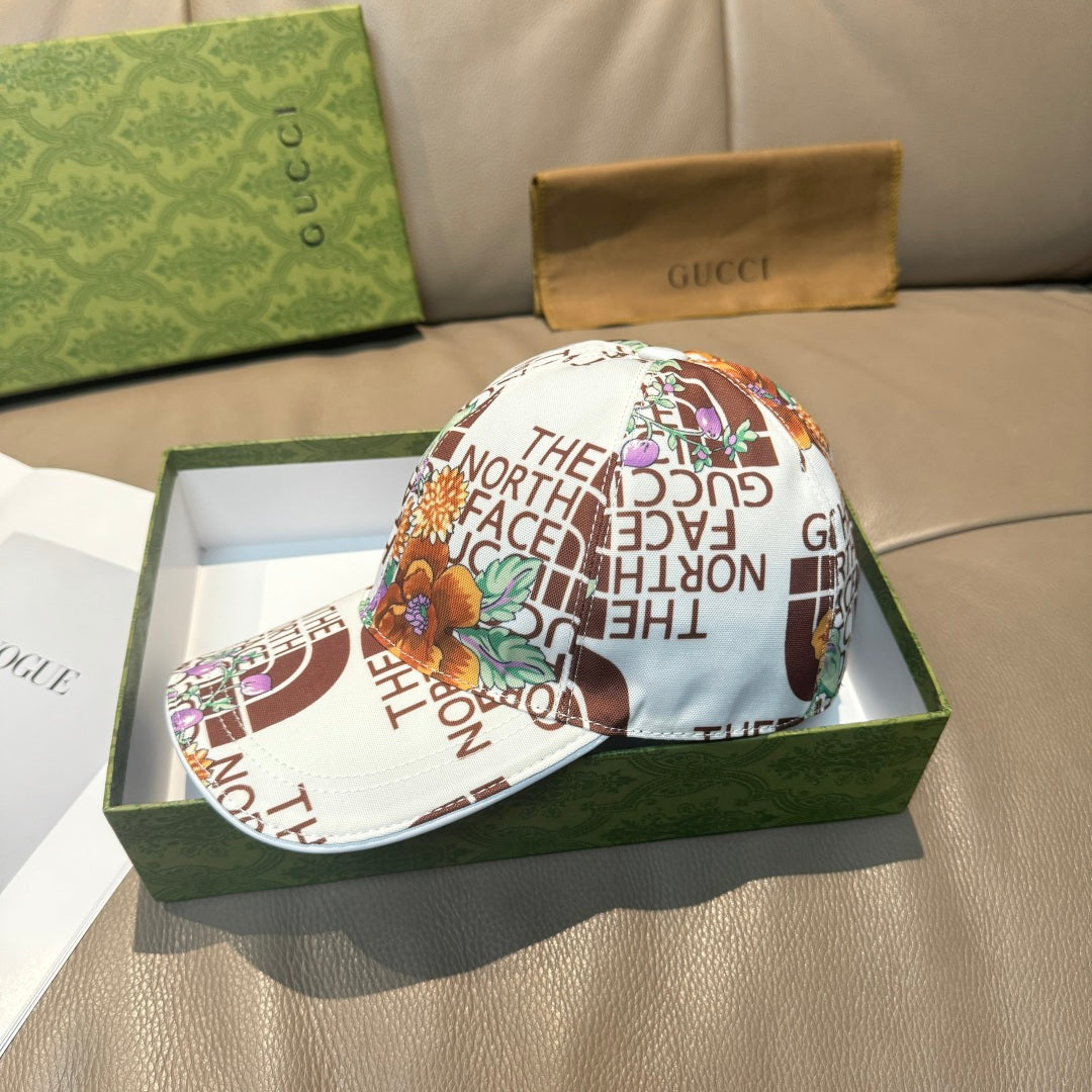 Gucci cap with white base and brown, purple, and green floral logo pattern, brim