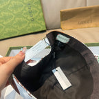 Gucci cap interior with black lining, white buckle strap, and hanging size tag