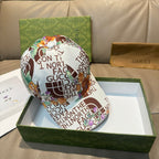 Gucci cap with white front and colorful floral text print, curved brim