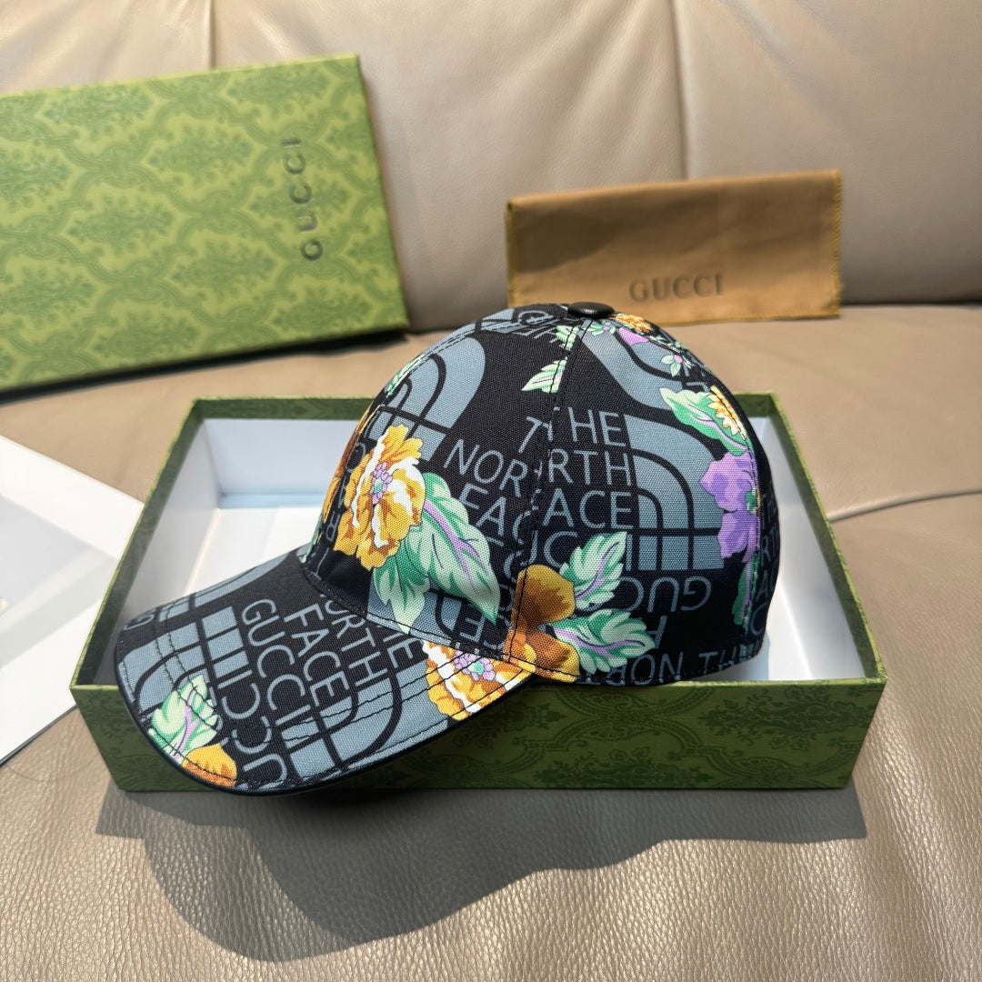 Gucci baseball cap, black with multicolor floral embroidery and North Face text