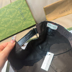 Gucci baseball cap strap and interior label, black fabric with Gucci branding
