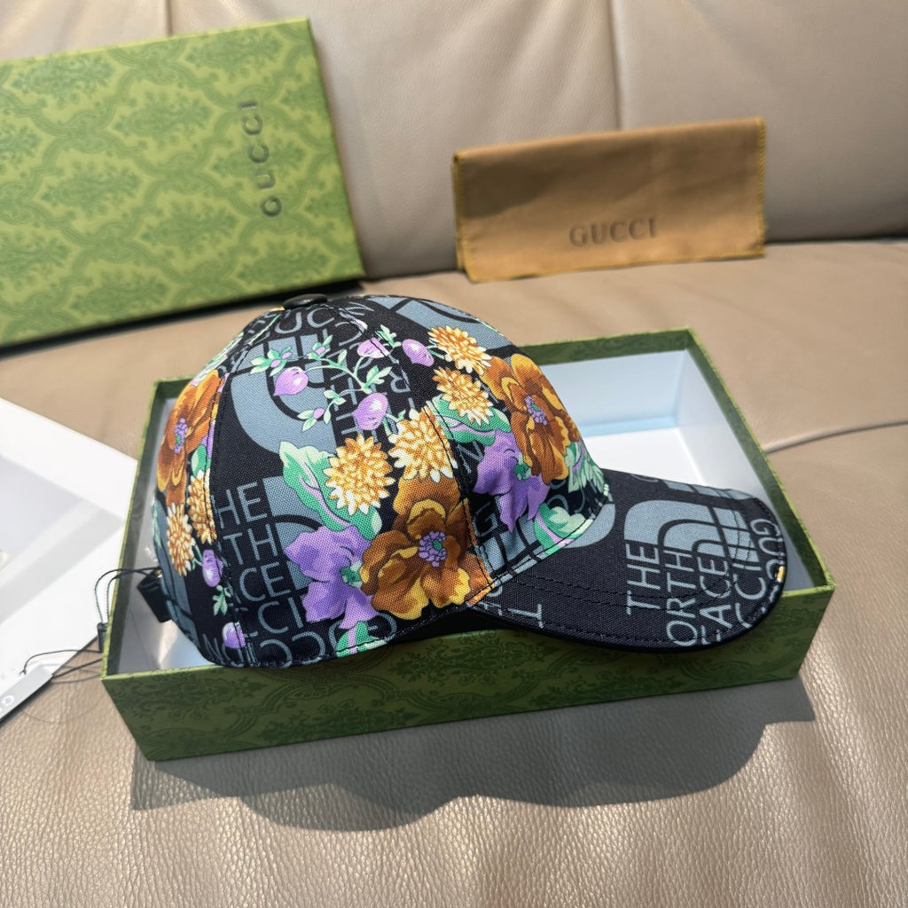 Gucci baseball cap with colorful floral print over black grid logo background