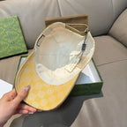 Yellow GG logo baseball cap interior with white lining and size tag