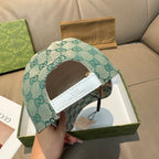 Gucci cap in light teal GG monogram canvas, side strap with leather keeper
