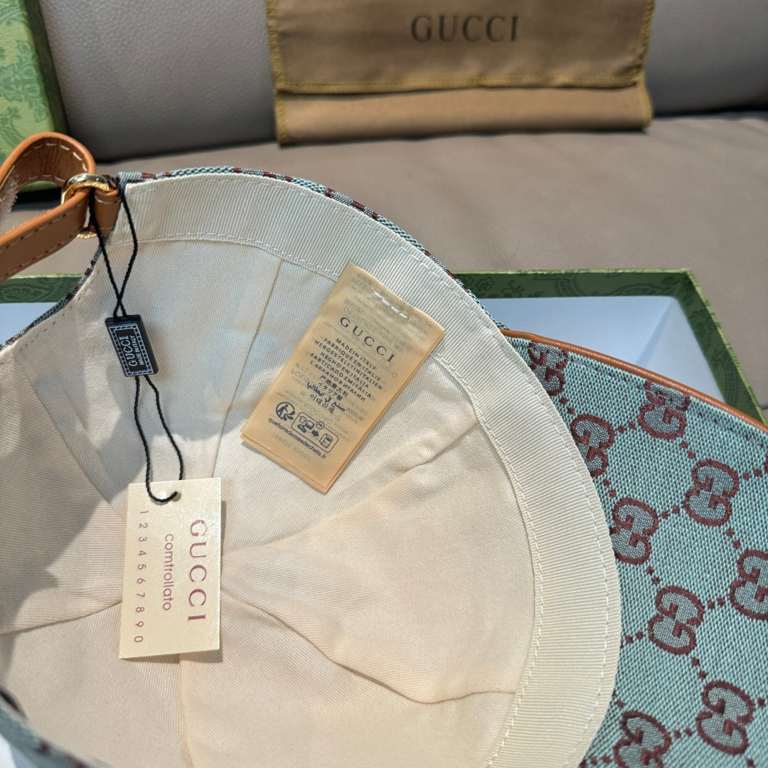 Gucci cap interior with white fabric lining and brand tag label; light blue GG pattern.