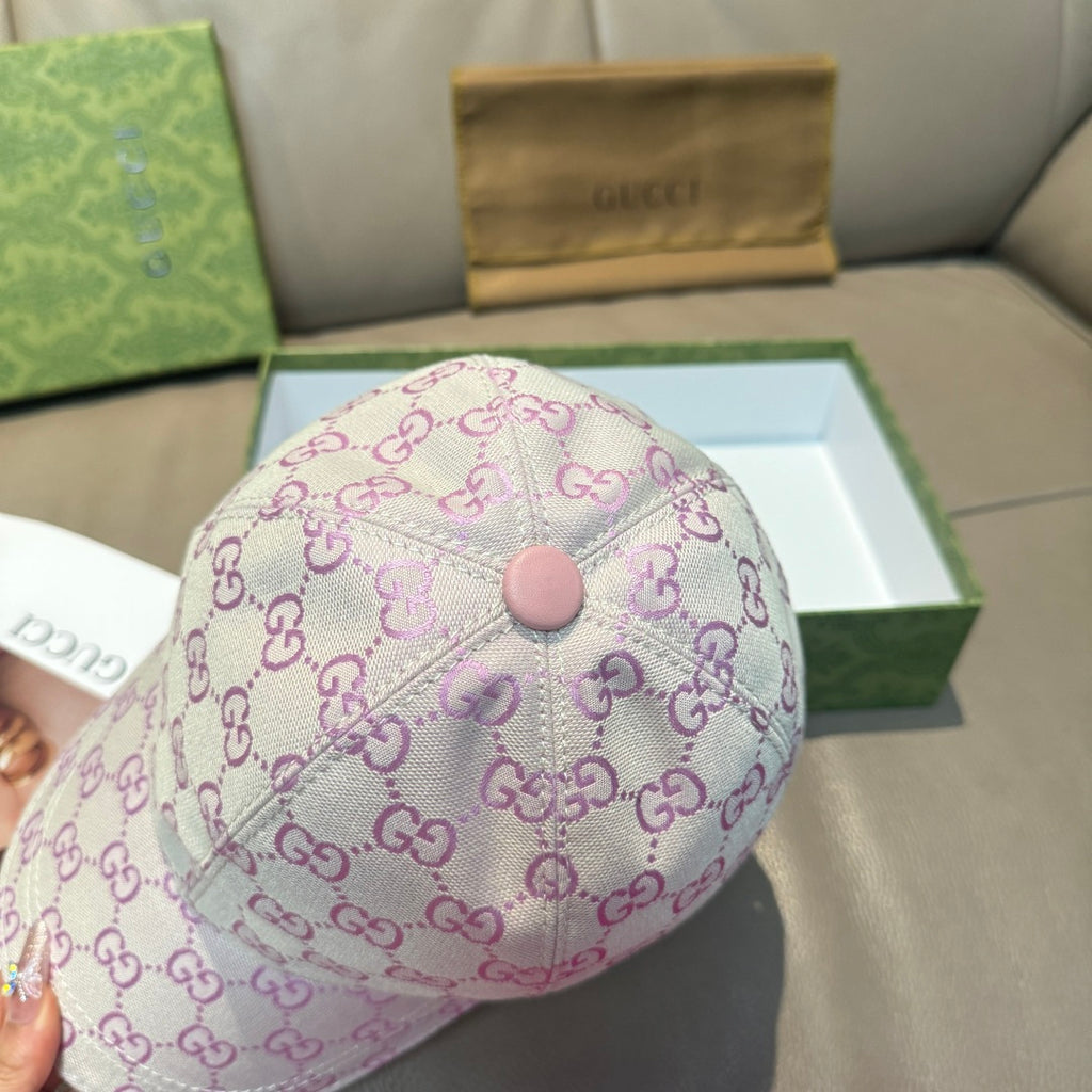 Gucci cap in pink and lavender GG monogram with button top detail
