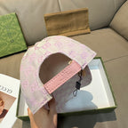 Gucci cap underside view with pink strap and visible beige lining
